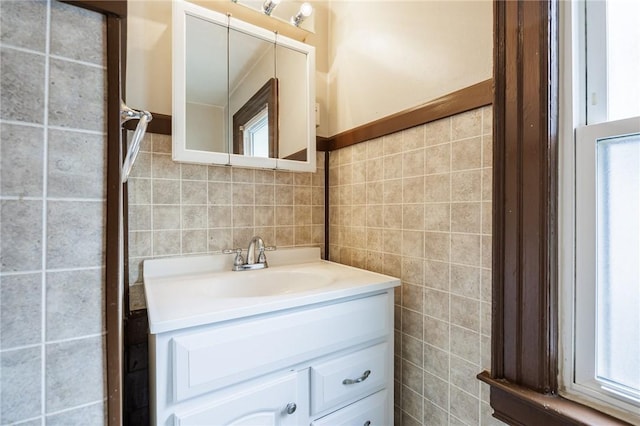 48 Rosedale St, Rochester, NY 14620 - bathroom with tile walls and vanity