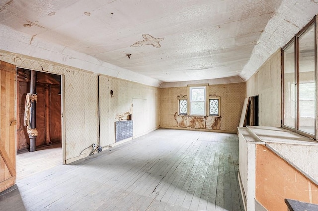 48 Rosedale St, Rochester, NY 14620 - unfurnished living room with light wood-style flooring