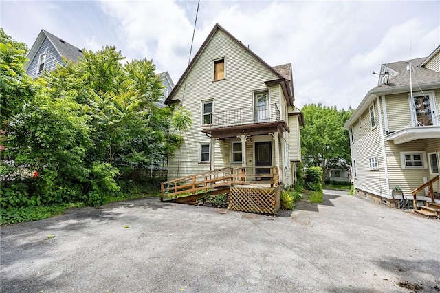 48 Rosedale St, Rochester, NY 14620 - view of front facade featuring a balcony