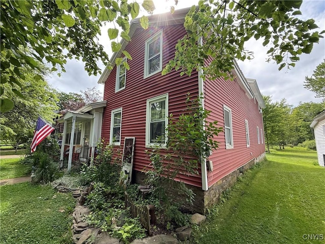 4935 N Jefferson St, Richland, NY 13142 - view of home's exterior with a yard