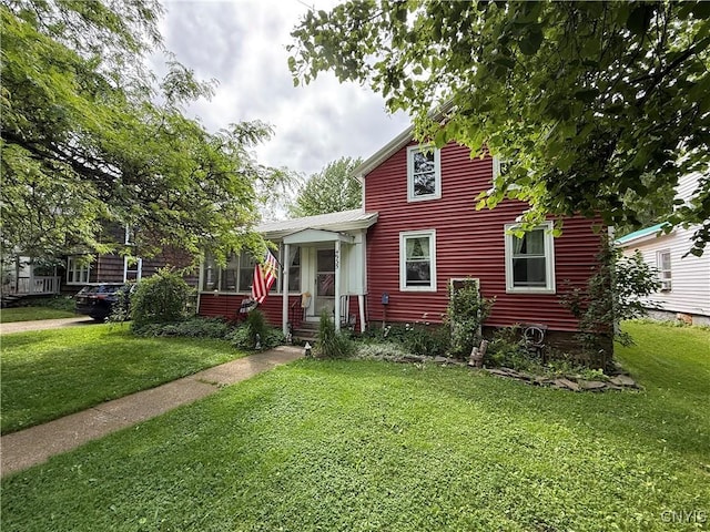 4935 N Jefferson St, Richland, NY 13142 - view of front of home featuring a front yard