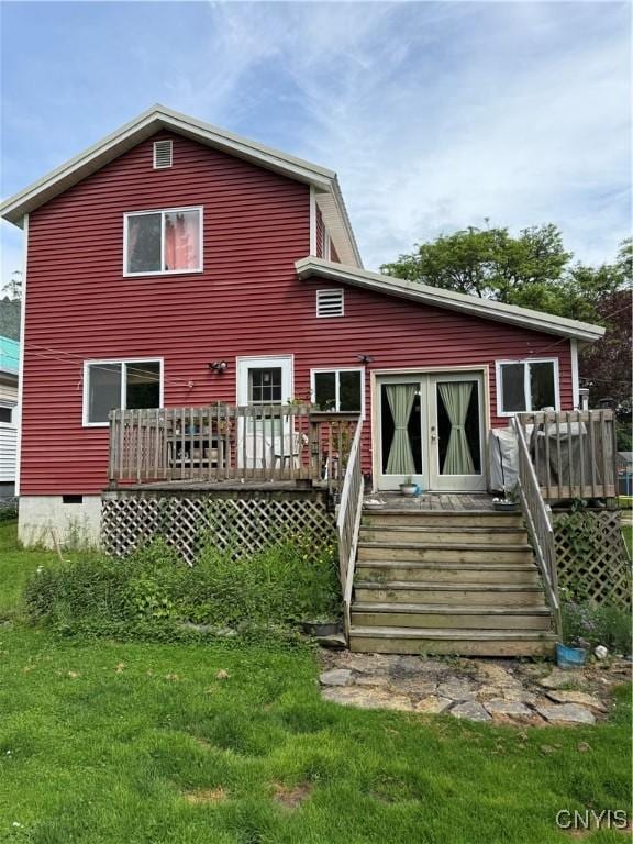 4935 N Jefferson St, Richland, NY 13142 - back of house with a wooden deck, crawl space, and a yard