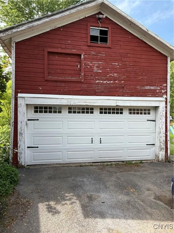 4935 N Jefferson St, Richland, NY 13142 - garage with driveway