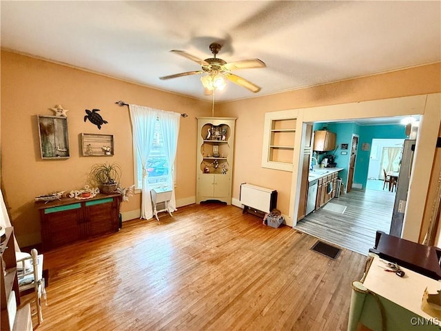 4935 N Jefferson St, Richland, NY 13142 - interior space with a ceiling fan, light wood-style floors, and built in shelves