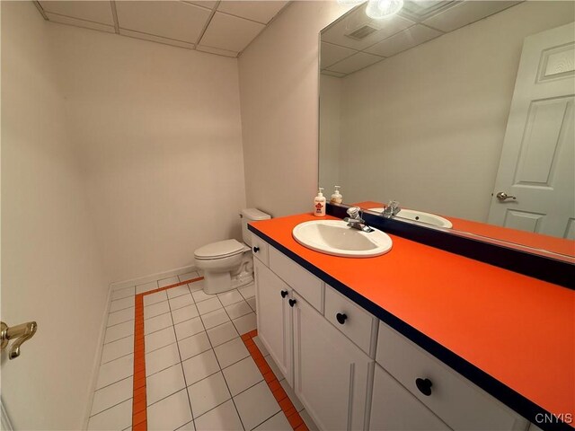 5326 Bunker Hill Way, Onondaga, NY 13207 - bathroom featuring a paneled ceiling, tile patterned floors, and vanity
