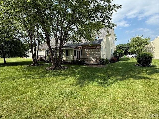 5326 Bunker Hill Way, Onondaga, NY 13207 - rear view of house featuring a lawn and a wooden deck