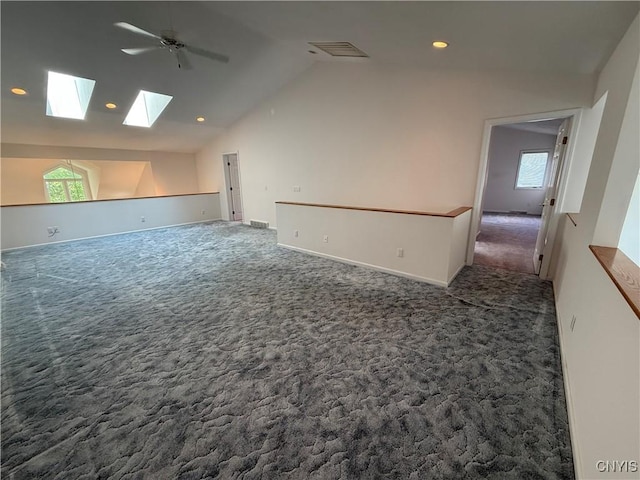 5326 Bunker Hill Way, Onondaga, NY 13207 - empty room with lofted ceiling, carpet flooring, a skylight, plenty of natural light, and recessed lighting