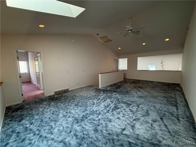 5326 Bunker Hill Way, Onondaga, NY 13207 - unfurnished room featuring carpet flooring, a skylight, vaulted ceiling, ceiling fan, and recessed lighting