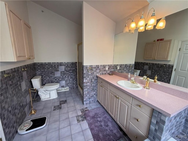 5326 Bunker Hill Way, Onondaga, NY 13207 - full bath with tile patterned flooring, tile walls, wainscoting, a stall shower, and vanity