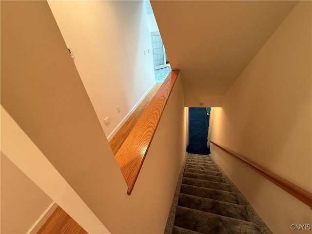 5326 Bunker Hill Way, Onondaga, NY 13207 - stairway featuring baseboards