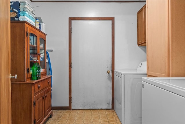 226 Academy St, Middletown, NY 12455 - laundry area featuring independent washer and dryer, light flooring, and cabinet space