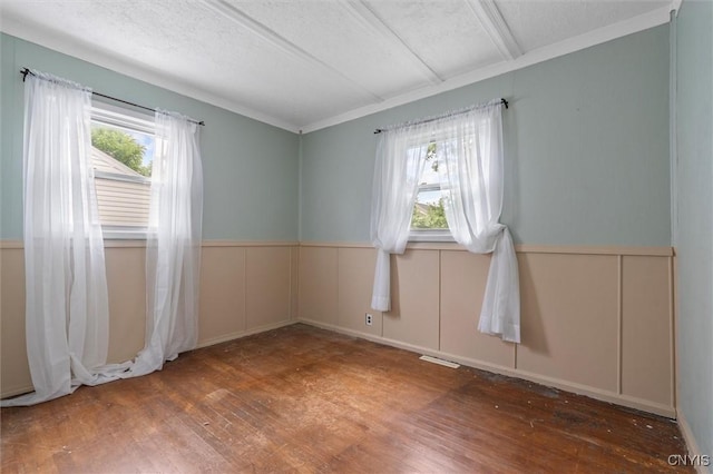 107 Edgeware Rd, Salina, NY 13208 - spare room with wood finished floors, plenty of natural light, and crown molding