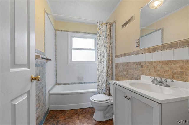 107 Edgeware Rd, Salina, NY 13208 - bathroom with tile walls, vanity, shower / bath combination with curtain, ornamental molding, and a wainscoted wall