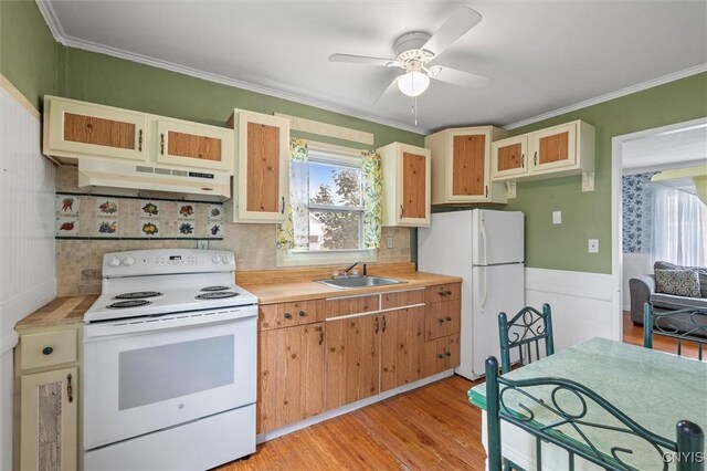 107 Edgeware Rd, Salina, NY 13208 - kitchen with white appliances, under cabinet range hood, light countertops, ceiling fan, and light wood-style flooring