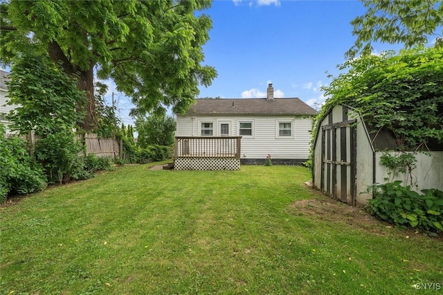 107 Edgeware Rd, Salina, NY 13208 - back of house with a storage shed, a wooden deck, and a chimney
