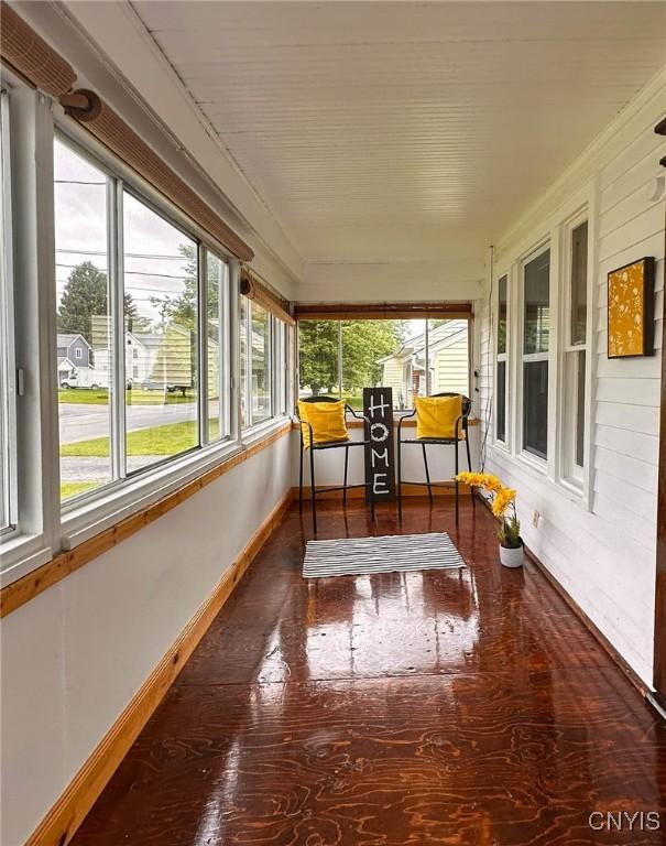 2132 Sinclair Ave, Whitestown, NY 13502 - sunroom with healthy amount of natural light and hardwood / wood-style flooring