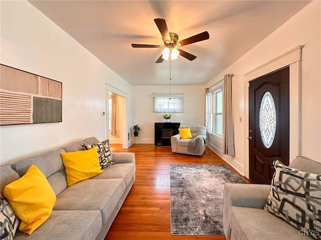 2132 Sinclair Ave, Whitestown, NY 13502 - living area with wood finished floors and ceiling fan