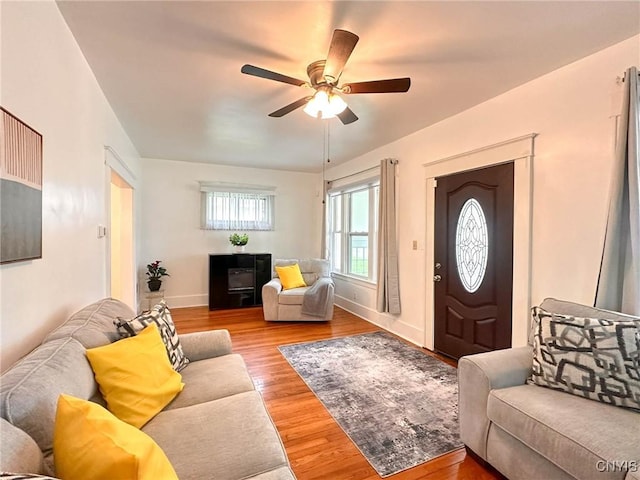 2132 Sinclair Ave, Whitestown, NY 13502 - living area featuring a ceiling fan and wood finished floors