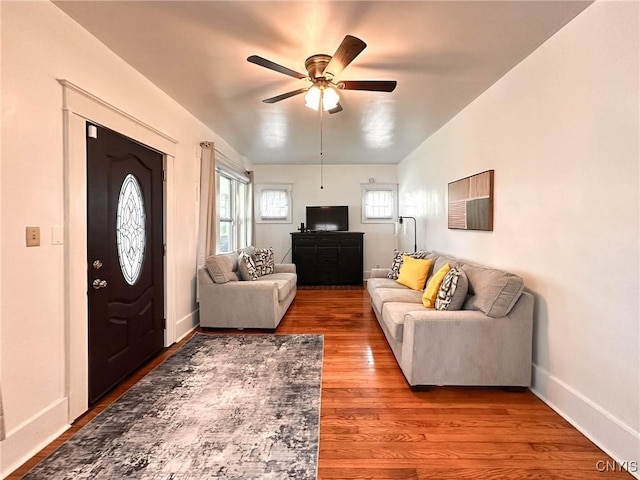 2132 Sinclair Ave, Whitestown, NY 13502 - living area with a ceiling fan and wood finished floors