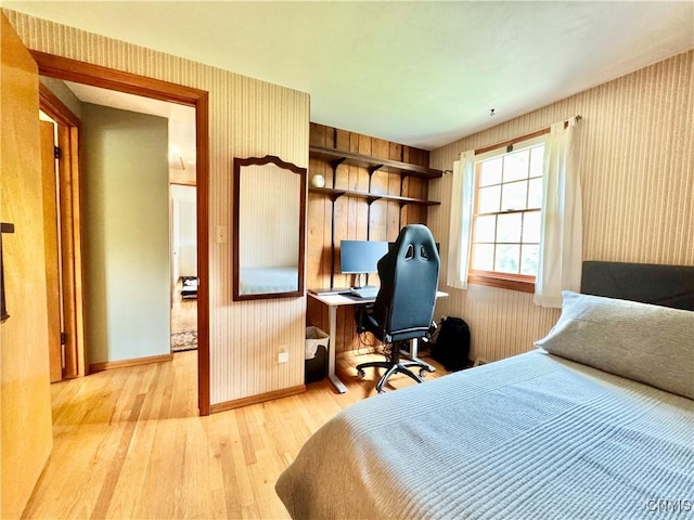 230 Thornton Cir S, Camillus, NY 13031 - bedroom featuring wallpapered walls, wood finished floors, and a desk