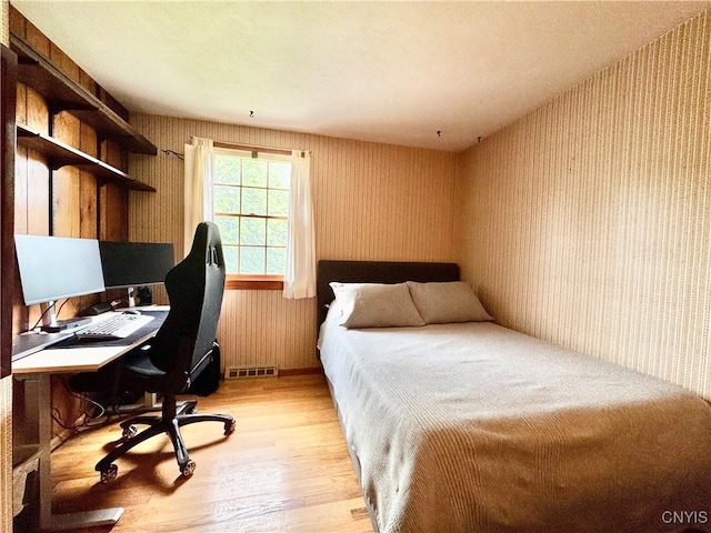 230 Thornton Cir S, Camillus, NY 13031 - bedroom featuring wallpapered walls, light wood-style flooring, and a desk