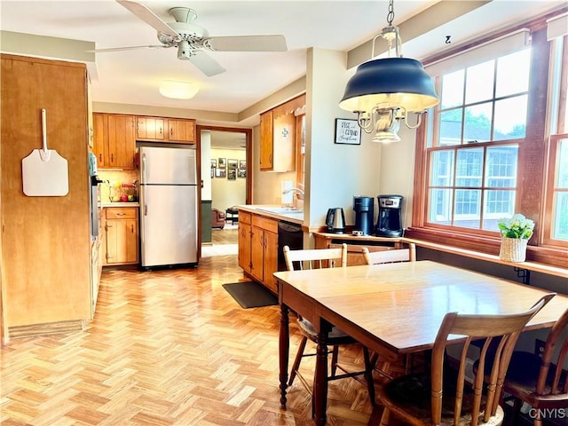 230 Thornton Cir S, Camillus, NY 13031 - dining area with healthy amount of natural light, ceiling fan, and a chandelier
