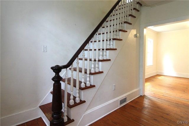 1500 Kimber Rd, Dewitt, NY 13078 - stairway featuring baseboards and hardwood / wood-style floors