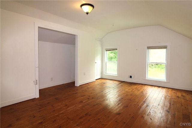 1500 Kimber Rd, Dewitt, NY 13078 - empty room with hardwood / wood-style floors and lofted ceiling