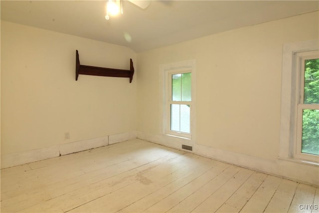1500 Kimber Rd, Dewitt, NY 13078 - spare room featuring hardwood / wood-style flooring and a ceiling fan
