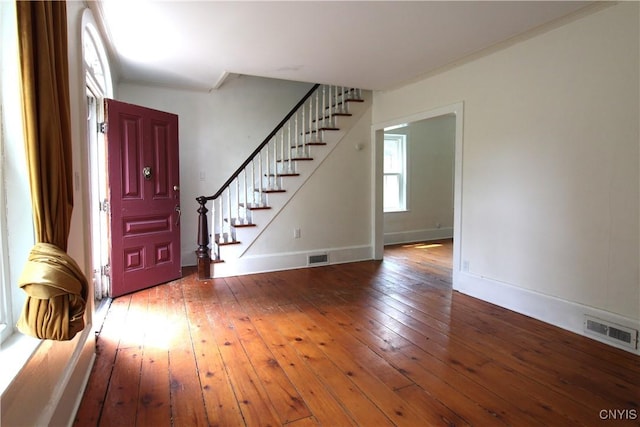 1500 Kimber Rd, Dewitt, NY 13078 - entrance foyer featuring stairs and hardwood / wood-style floors