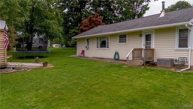 7 Bakeman St, Fulton, NY 13069 - view of green lawn featuring a trampoline