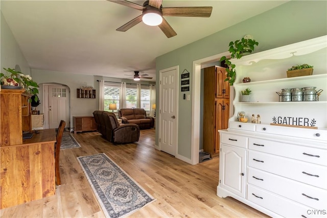 7 Bakeman St, Fulton, NY 13069 - kitchen with a ceiling fan, arched walkways, white cabinetry, light wood-type flooring, and open shelves