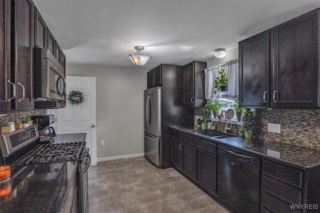 84 Kurtz Ave, Lancaster, NY 14086 - kitchen featuring stainless steel appliances, backsplash, and dark stone counters