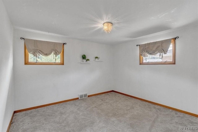 84 Kurtz Ave, Lancaster, NY 14086 - spare room featuring healthy amount of natural light and carpet flooring