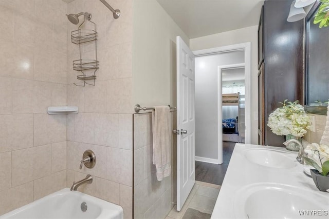 84 Kurtz Ave, Lancaster, NY 14086 - full bath with shower / bathtub combination, double vanity, and tile patterned flooring