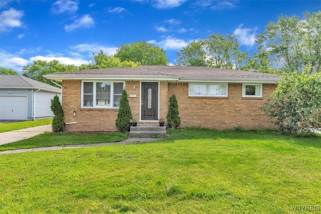84 Kurtz Ave, Lancaster, NY 14086 - view of front of house with brick siding and a front yard