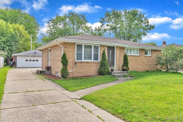 84 Kurtz Ave, Lancaster, NY 14086 - ranch-style house featuring brick siding, an outdoor structure, a front lawn, and a detached garage