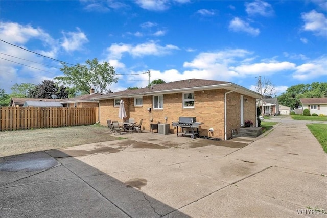84 Kurtz Ave, Lancaster, NY 14086 - back of property featuring a patio area and brick siding