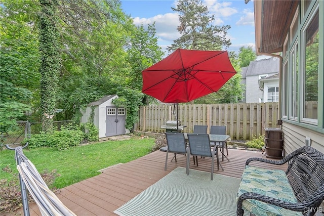 135 Strong Ave, Syracuse, NY 13210 - deck featuring outdoor dining space, a storage unit, and a fenced backyard