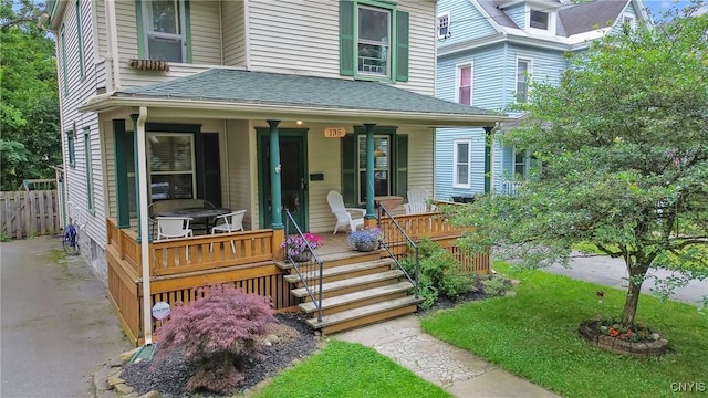 135 Strong Ave, Syracuse, NY 13210 - view of front of house with a porch and a shingled roof