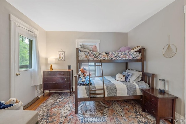 135 Strong Ave, Syracuse, NY 13210 - bedroom with wood finished floors and baseboards