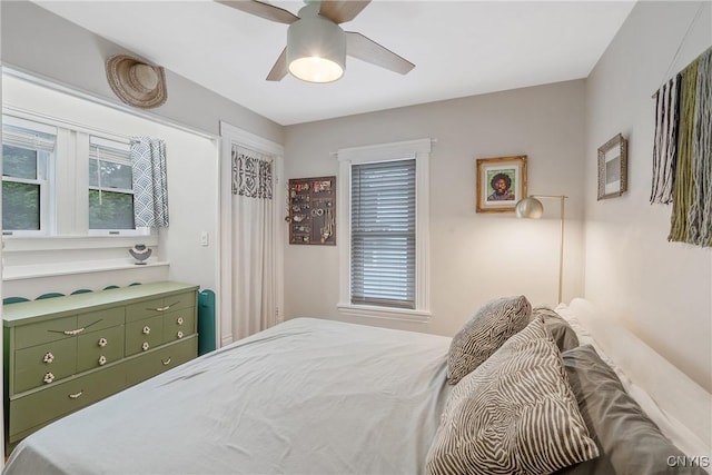 135 Strong Ave, Syracuse, NY 13210 - bedroom with multiple windows and a ceiling fan