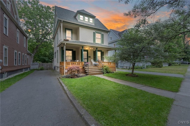 135 Strong Ave, Syracuse, NY 13210 - american foursquare style home featuring covered porch, driveway, and a yard