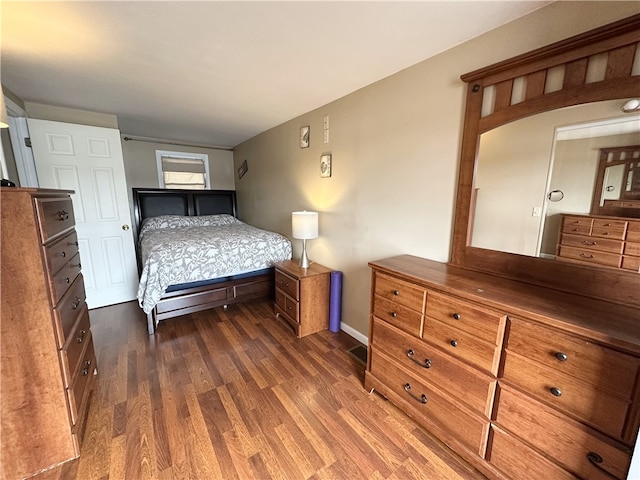 5968 E Lake Rd, Conesus, NY 14435 - bedroom featuring dark wood-type flooring and baseboards