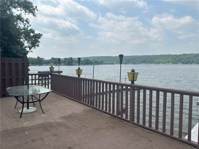 5968 E Lake Rd, Conesus, NY 14435 - view of patio / terrace with a water view