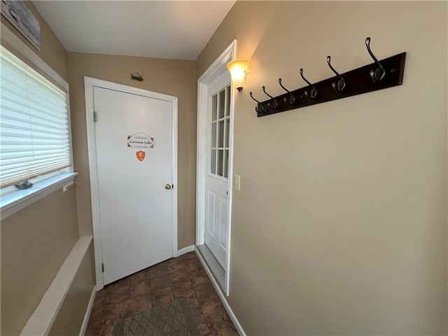 5968 E Lake Rd, Conesus, NY 14435 - doorway with stone finish flooring and baseboards