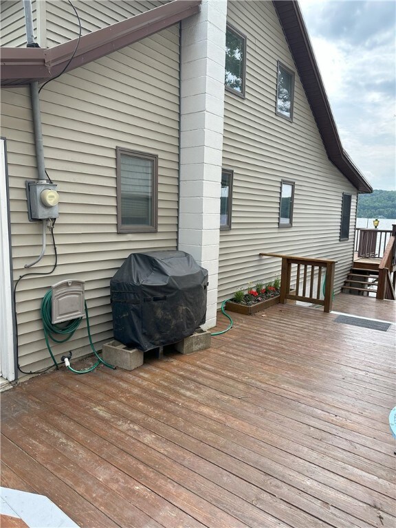 5968 E Lake Rd, Conesus, NY 14435 - wooden deck featuring a grill