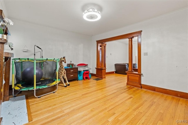 606 Tompkins St, Syracuse, NY 13204 - playroom featuring wood finished floors and ornamental molding