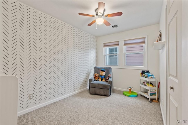 606 Tompkins St, Syracuse, NY 13204 - playroom featuring carpet flooring, a ceiling fan, and an accent wall