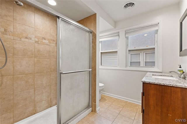 606 Tompkins St, Syracuse, NY 13204 - bathroom with a stall shower, vanity, and tile patterned flooring